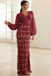 Vestido de fiesta azul de manga larga con abertura alta y borlas